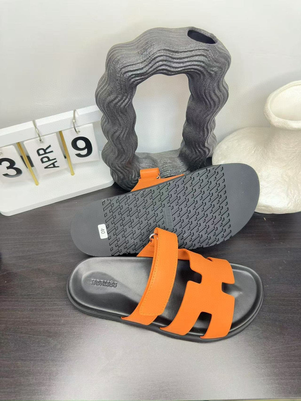 Hermès Orange Interwoven Slide Sandals - Orange and Black