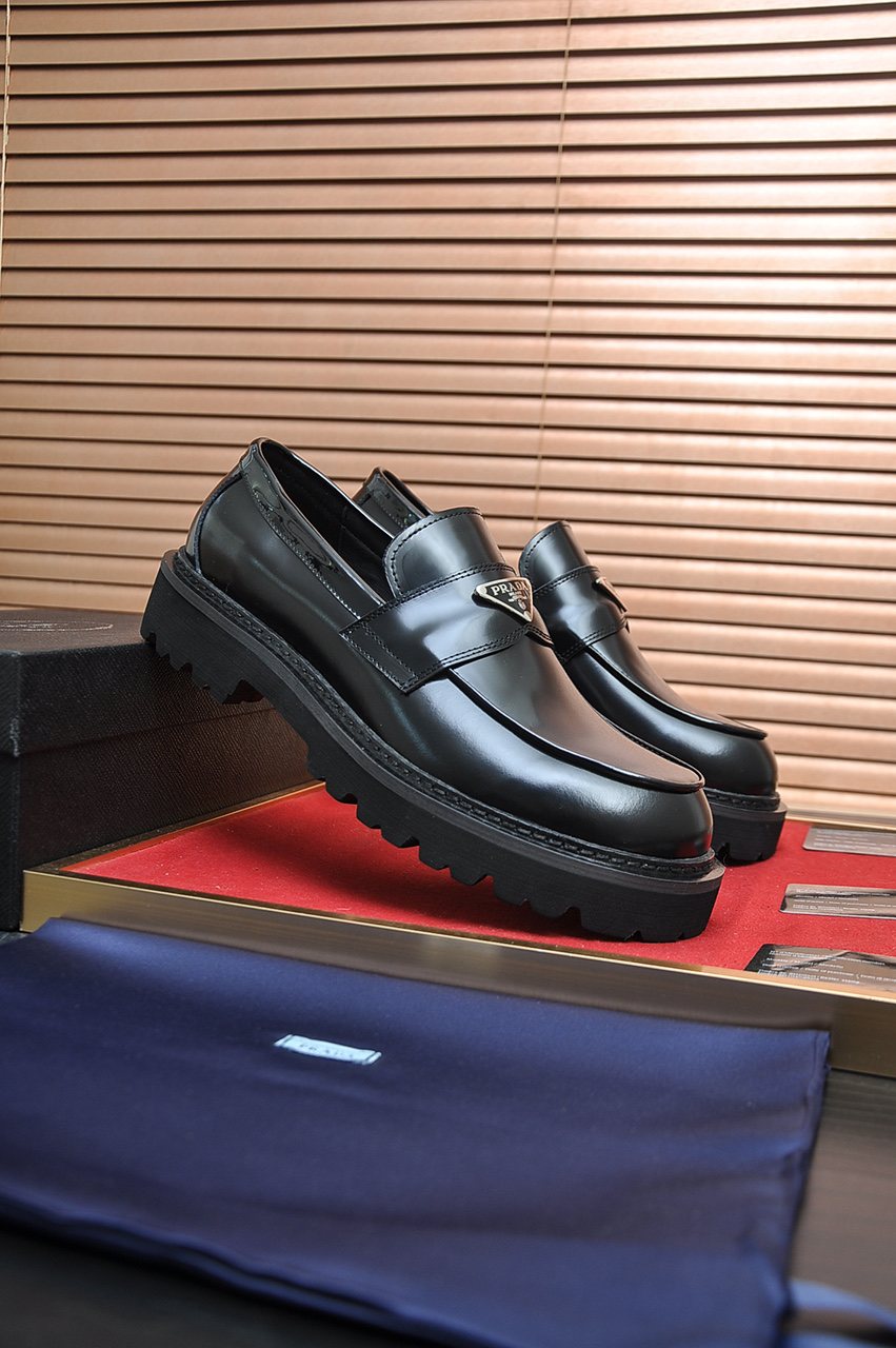Prada Lug-Sole Strap Loafers