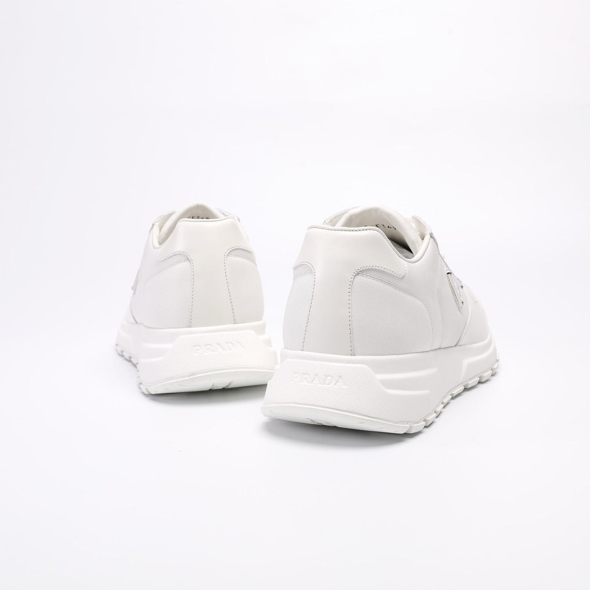 Prada Men's Triangle Plaque Low-Top Sneakers - Lugged Outsole
